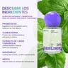 CEELIKE Kiss Artifact Spray Oral Refrescante bottle on green leaves background with purple cap and clear glass body