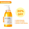 Orange bottle of Quarxery Mite & Acne Cleansing Body Wash with white pump dispenser.