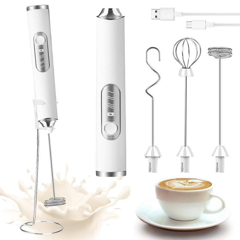 Electric milk frother and accessories, white and silver, on white background with cup of coffee.